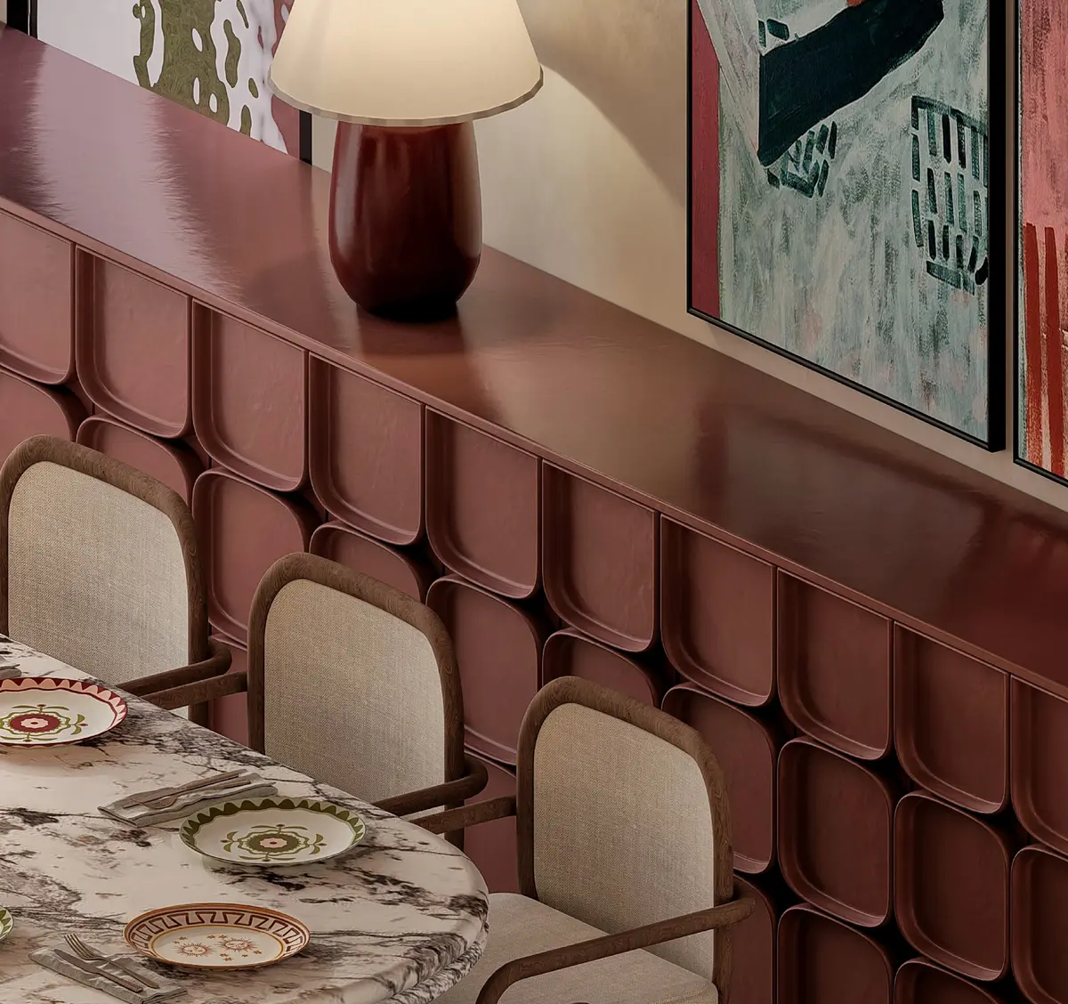 Detail of the scalloped terracotta sideboard with a burgundy table lamp