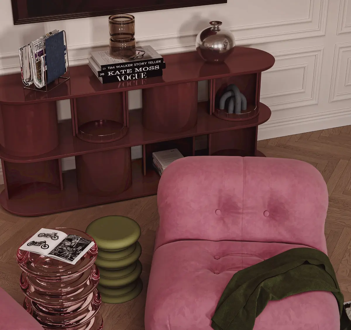 Pink velvet armchair in front of a glossy burgundy sideboard